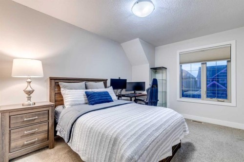 61 Masters Landing Se, Calgary, AB - Indoor Photo Showing Bedroom