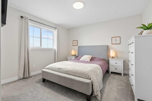 60 Ranchers View, Okotoks, AB - Indoor Photo Showing Bedroom
