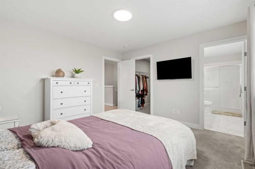 60 Ranchers View, Okotoks, AB - Indoor Photo Showing Bedroom