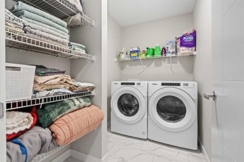 60 Ranchers View, Okotoks, AB - Indoor Photo Showing Laundry Room