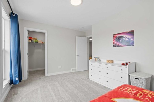 60 Ranchers View, Okotoks, AB - Indoor Photo Showing Bedroom