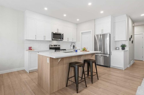 60 Ranchers View, Okotoks, AB - Indoor Photo Showing Kitchen With Stainless Steel Kitchen With Upgraded Kitchen