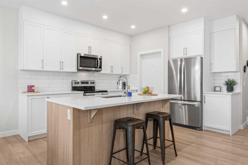 60 Ranchers View, Okotoks, AB - Indoor Photo Showing Kitchen With Stainless Steel Kitchen With Upgraded Kitchen