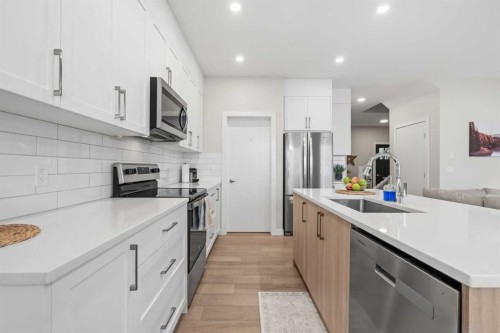 60 Ranchers View, Okotoks, AB - Indoor Photo Showing Kitchen With Stainless Steel Kitchen With Upgraded Kitchen