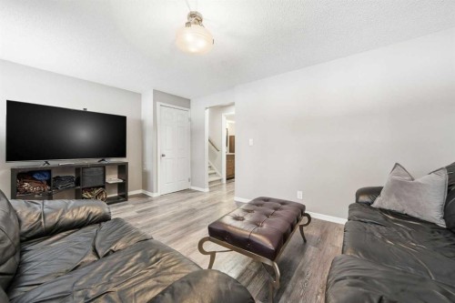 941 Macleod Trail Sw, High River, AB - Indoor Photo Showing Living Room