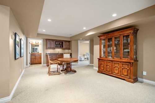 341 1 Avenue Se, Diamond Valley, AB - Indoor Photo Showing Other Room With Fireplace