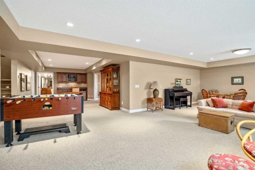341 1 Avenue Se, Diamond Valley, AB - Indoor With Fireplace