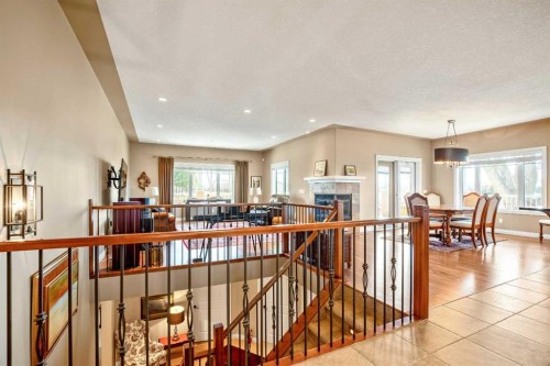 341 1 Avenue Se, Diamond Valley, AB - Indoor With Fireplace
