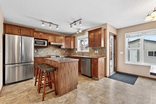 57 Everridge Way Sw, Calgary, AB - Indoor Photo Showing Kitchen With Stainless Steel Kitchen