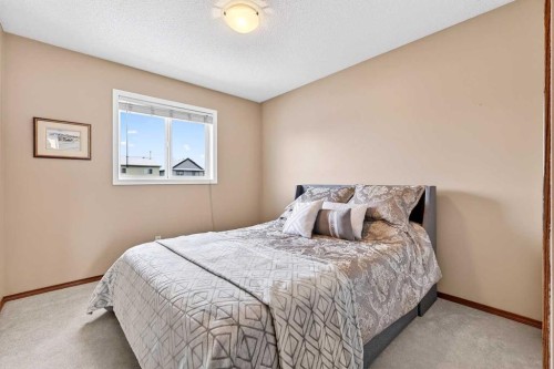 57 Everridge Way Sw, Calgary, AB - Indoor Photo Showing Bedroom