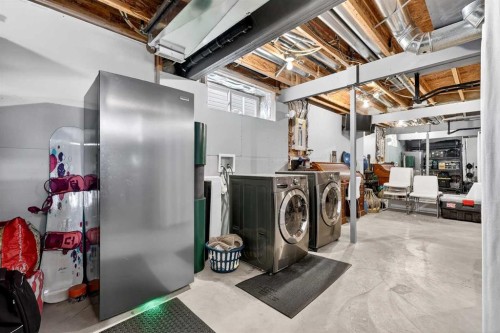 57 Everridge Way Sw, Calgary, AB - Indoor Photo Showing Laundry Room