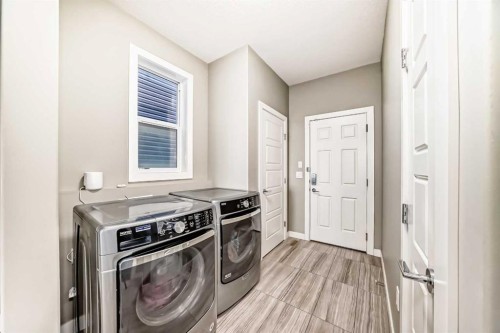 184 Sherview Grove Nw, Calgary, AB - Indoor Photo Showing Laundry Room