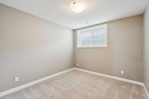 166 Legacy Common Se, Calgary, AB - Indoor Photo Showing Other Room