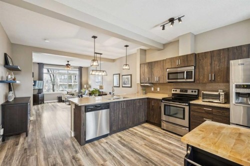 166 Legacy Common Se, Calgary, AB - Indoor Photo Showing Kitchen With Upgraded Kitchen