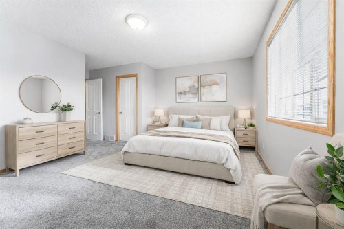 14 Taralea Bay Ne, Calgary, AB - Indoor Photo Showing Bedroom
