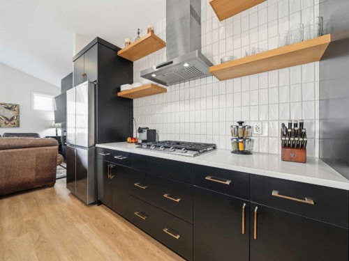 111 Haskayne Drive Nw, Calgary, AB - Indoor Photo Showing Kitchen With Upgraded Kitchen
