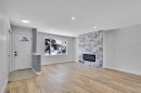 363 Templeside Circle Ne, Calgary, AB  - Indoor Photo Showing Living Room With Fireplace 