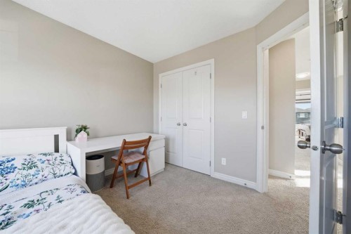 67 Evanspark Road Nw, Calgary, AB - Indoor Photo Showing Bedroom