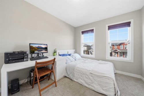 67 Evanspark Road Nw, Calgary, AB - Indoor Photo Showing Bedroom