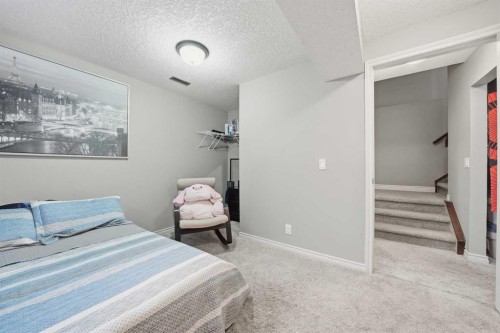 67 Evanspark Road Nw, Calgary, AB - Indoor Photo Showing Bedroom