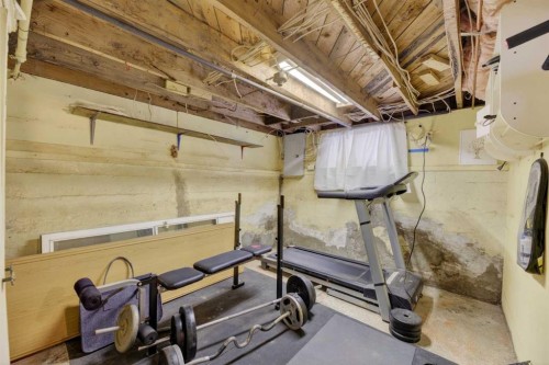 4625 47 Avenue, Olds, AB - Indoor Photo Showing Gym Room