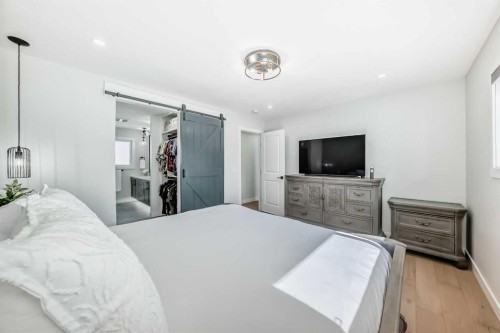 9215 Allison Drive Se, Calgary, AB - Indoor Photo Showing Bedroom