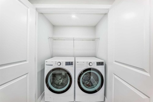 9215 Allison Drive Se, Calgary, AB - Indoor Photo Showing Laundry Room