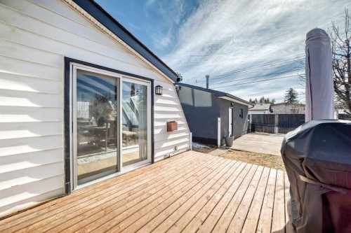 9215 Allison Drive Se, Calgary, AB - Outdoor With Deck Patio Veranda With Exterior