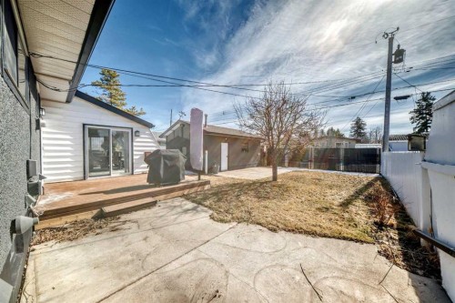 9215 Allison Drive Se, Calgary, AB - Outdoor With Deck Patio Veranda With Exterior