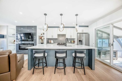 9215 Allison Drive Se, Calgary, AB - Indoor Photo Showing Kitchen With Stainless Steel Kitchen With Upgraded Kitchen