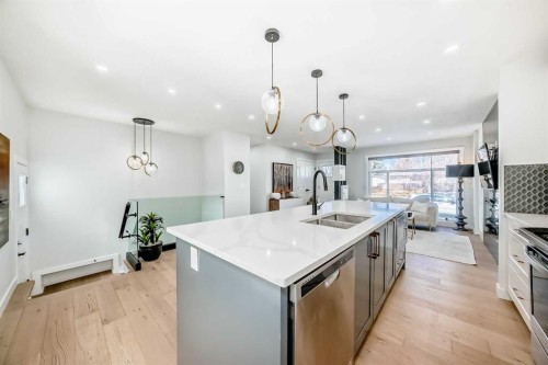 9215 Allison Drive Se, Calgary, AB - Indoor Photo Showing Kitchen With Double Sink With Upgraded Kitchen