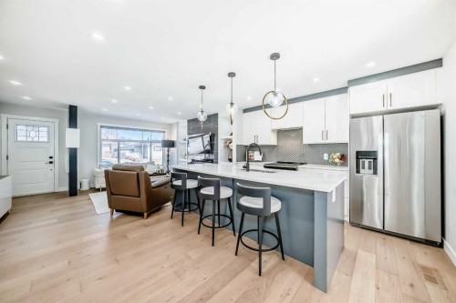 9215 Allison Drive Se, Calgary, AB - Indoor Photo Showing Kitchen With Stainless Steel Kitchen With Upgraded Kitchen