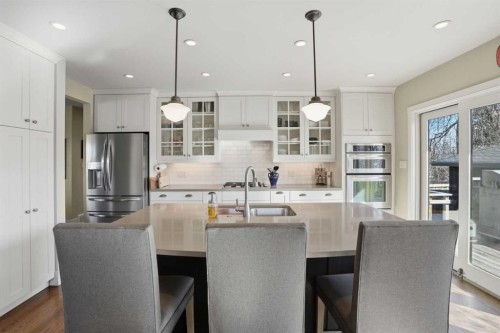 2013 22 Avenue Sw, Calgary, AB - Indoor Photo Showing Kitchen With Stainless Steel Kitchen With Double Sink With Upgraded Kitchen