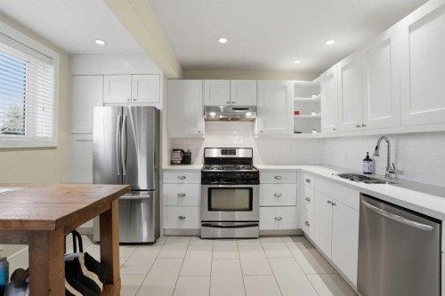 2013 22 Avenue Sw, Calgary, AB - Indoor Photo Showing Kitchen With Stainless Steel Kitchen With Double Sink