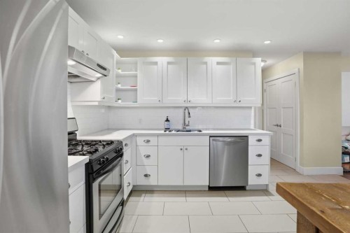 2013 22 Avenue Sw, Calgary, AB - Indoor Photo Showing Kitchen With Stainless Steel Kitchen