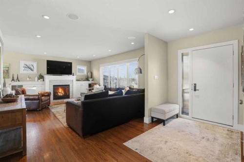 2013 22 Avenue Sw, Calgary, AB - Indoor Photo Showing Living Room With Fireplace