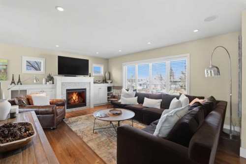 2013 22 Avenue Sw, Calgary, AB - Indoor Photo Showing Living Room With Fireplace
