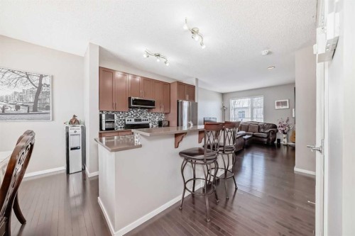 188 Chapalina Square Se, Calgary, AB - Indoor Photo Showing Kitchen With Upgraded Kitchen