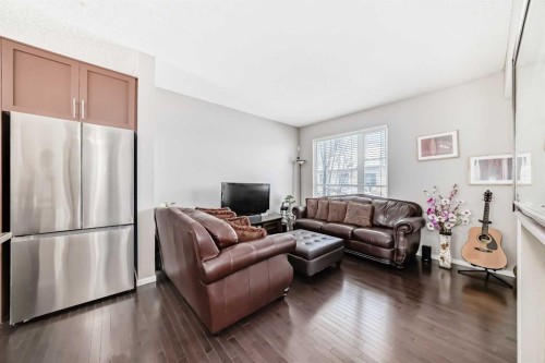 188 Chapalina Square Se, Calgary, AB - Indoor Photo Showing Living Room