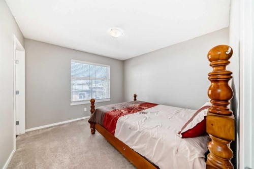 188 Chapalina Square Se, Calgary, AB - Indoor Photo Showing Bedroom