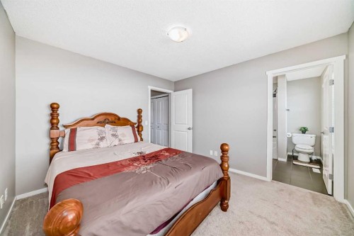 188 Chapalina Square Se, Calgary, AB - Indoor Photo Showing Bedroom