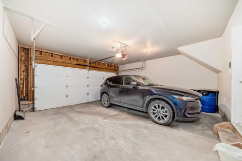 188 Chapalina Square Se, Calgary, AB - Indoor Photo Showing Garage