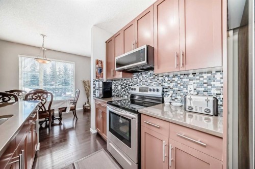 188 Chapalina Square Se, Calgary, AB - Indoor Photo Showing Kitchen With Upgraded Kitchen
