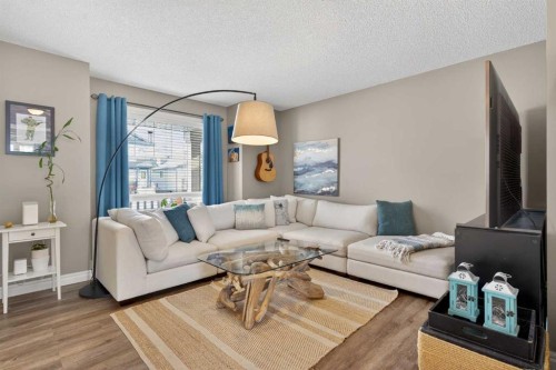 194 Arbour Meadows Close Nw, Calgary, AB - Indoor Photo Showing Living Room