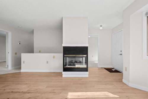 2640 Dovely Court Se, Calgary, AB - Indoor With Fireplace