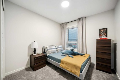 224 Vantage Drive, Cochrane, AB - Indoor Photo Showing Bedroom