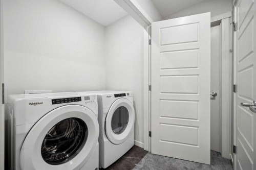 224 Vantage Drive, Cochrane, AB - Indoor Photo Showing Laundry Room