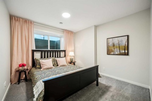 224 Vantage Drive, Cochrane, AB - Indoor Photo Showing Bedroom