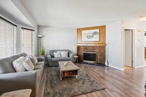6503 Rundlehorn Drive Ne, Calgary, AB - Indoor Photo Showing Living Room With Fireplace