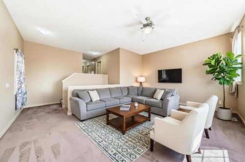 273 Silverado Plains Close Sw, Calgary, AB - Indoor Photo Showing Living Room
